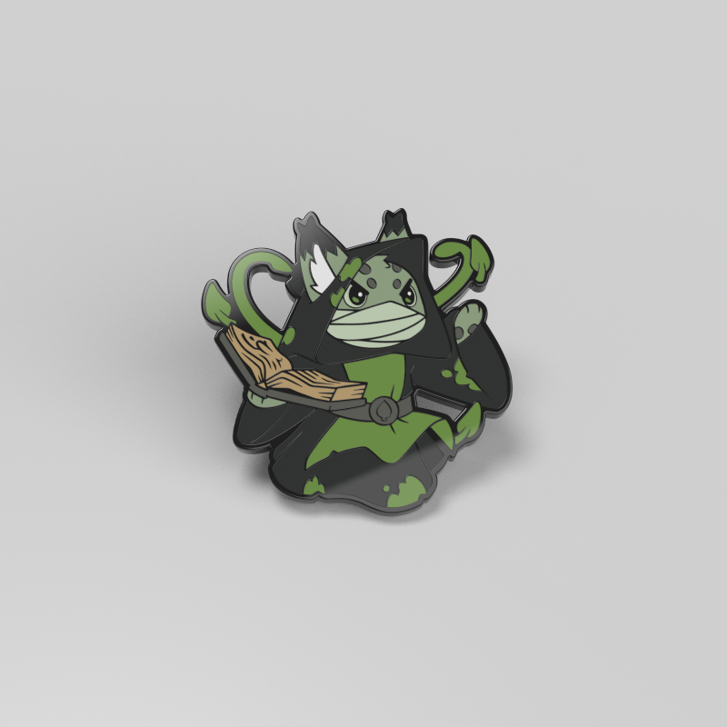 A green, cat-like creature known as Porella the Leaf Sage from Unstable Games wears a hooded black cloak while holding a wooden staff. The metal and enamel adornments on the cloak suggest it might serve as a coveted accessory for decorating bags. With an intense expression, Porella exudes a Command of Nature, ready for action in its enamel pin form.