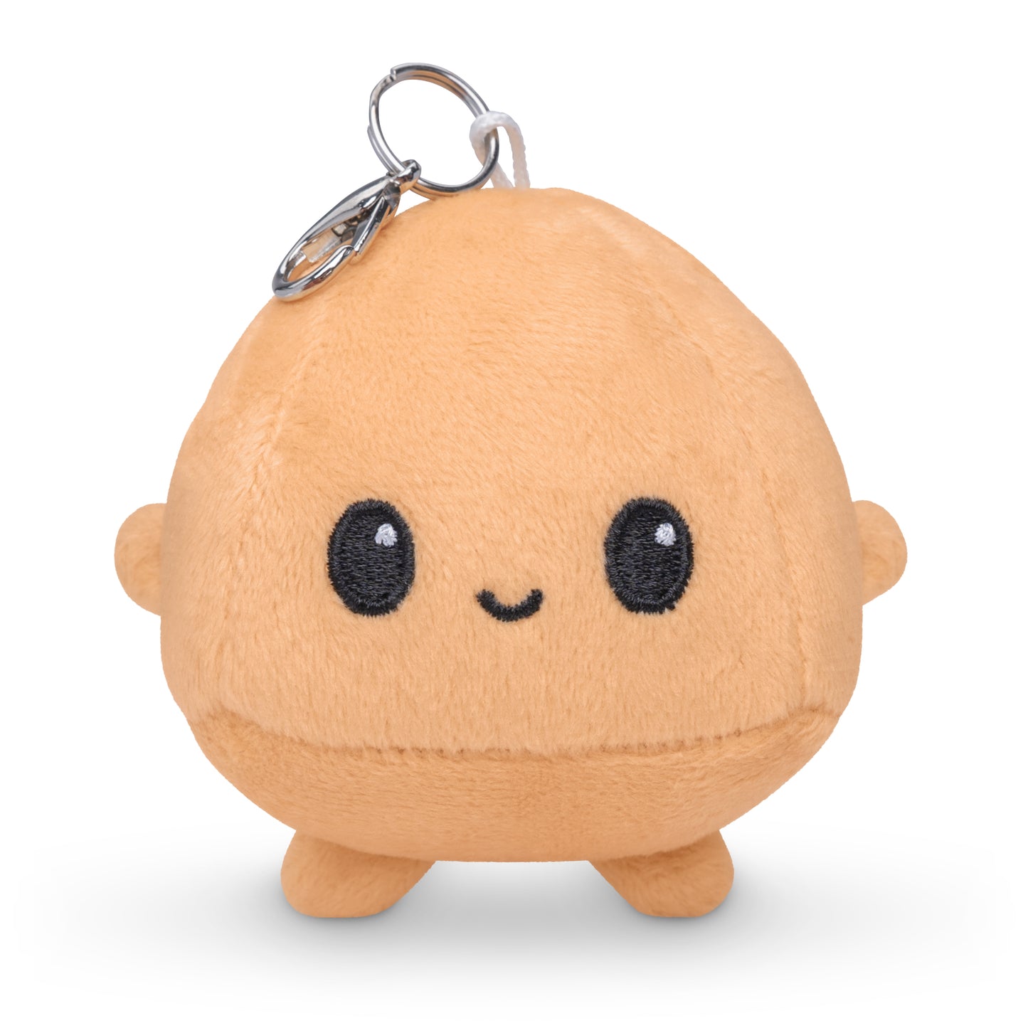 A small, round, tan plush toy with a keychain attached. Named the Clay Plushie Charm Keychain by Unstable Games, it features black, round eyes and a simple, smiling mouth.