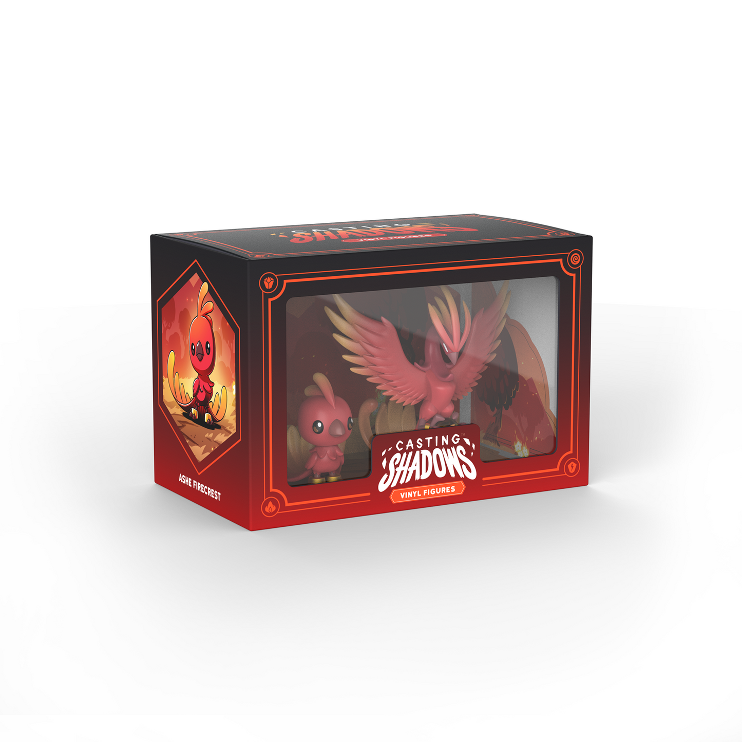 A boxed set of red vinyl figures titled "Casting Shadows: Ashe Firecrest & Ashe the Inferno Vinyl Figure Set" from Unstable Games features illustrated packaging and a window showcasing two bird-like characters.