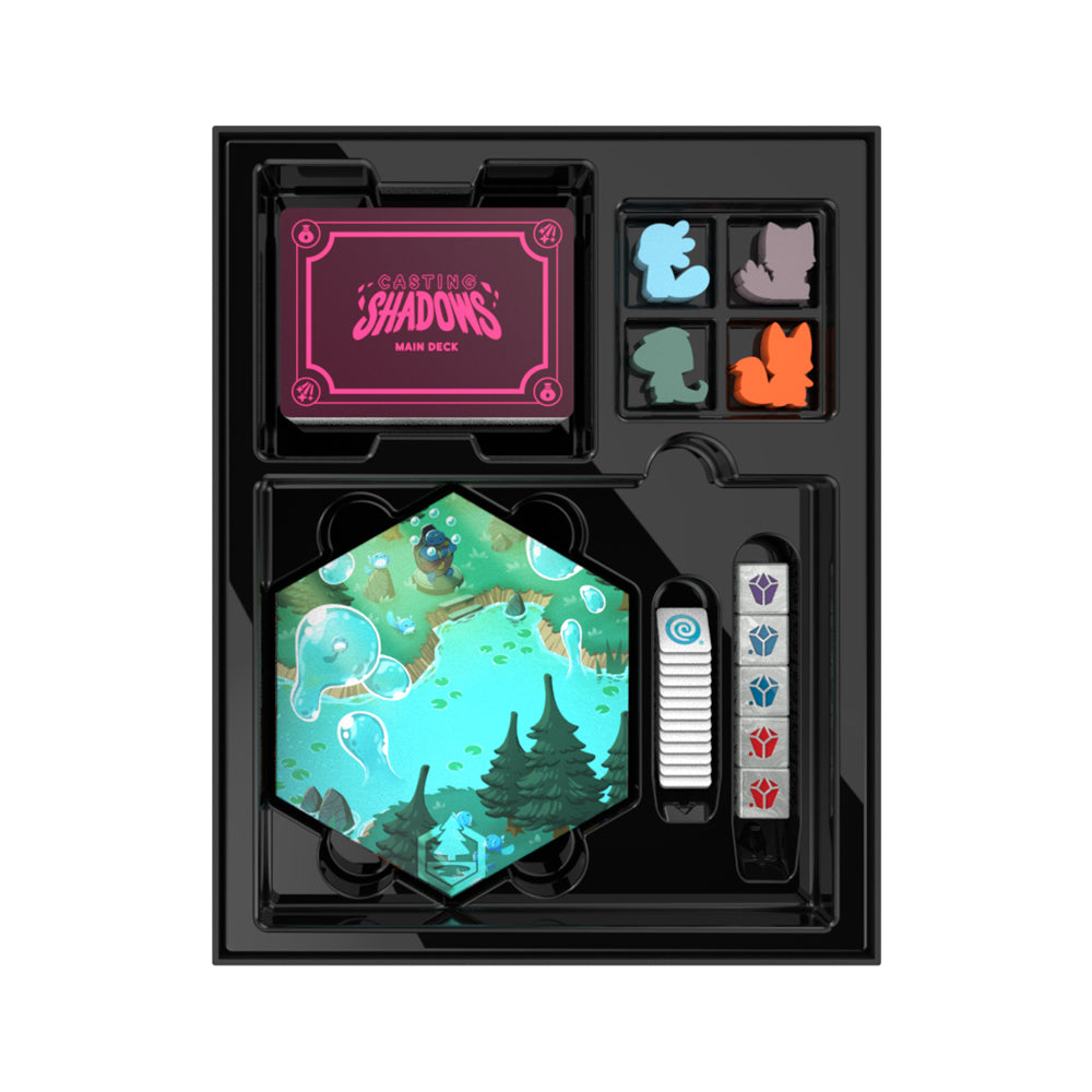 Open Unstable Games' Casting Shadows: Base Game + The Ice Storm Expansion Bundle box containing a main deck, hexagonal game tiles, and various colorful tokens shaped like creatures, set against a black background.