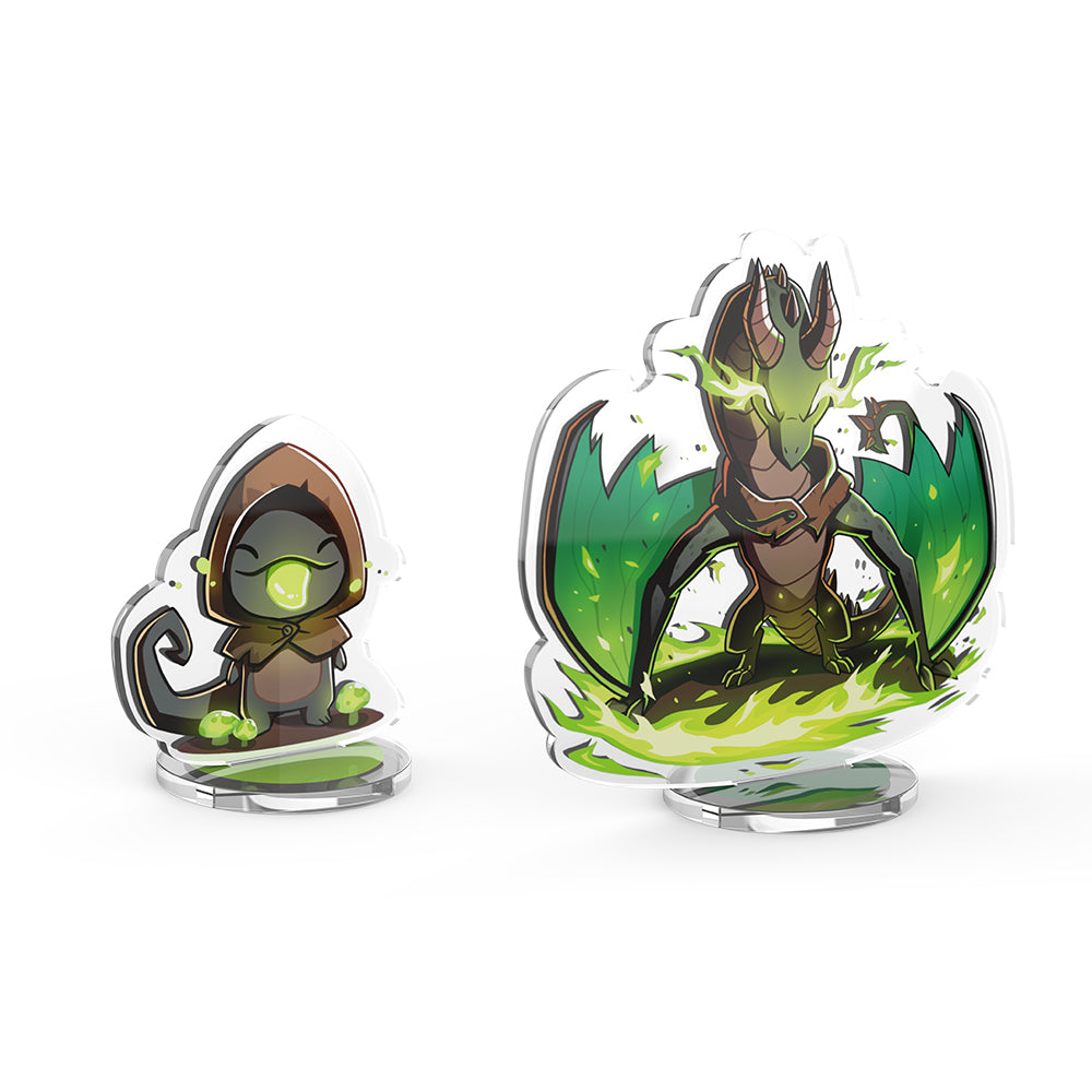 Two Casting Shadows: Haze Greentongue & Haze the Devastator standees featuring animated characters: one is a small figure with a glowing green orb, and the other is a larger creature with horns emerging from lush greenery, both casting shadows. Created by Unstable Games.