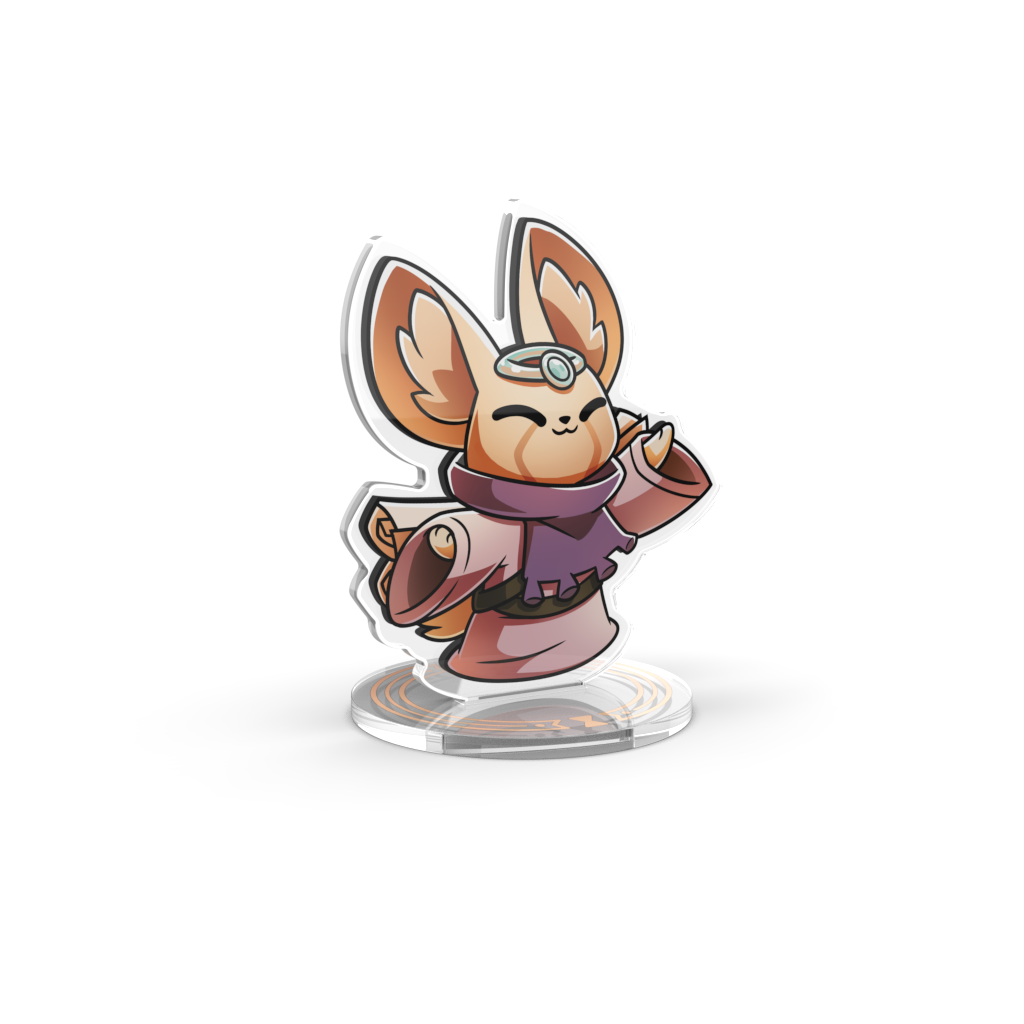 The Command of Nature: Sand & Wind Expansion Standee Set by Unstable Games features a small, cartoonish fox-like character adorned with a purple scarf and headband, standing proudly on a clear round base. This delightful figure is perfect for fans of desk toys, embodying a playful Command of Nature in its stance.