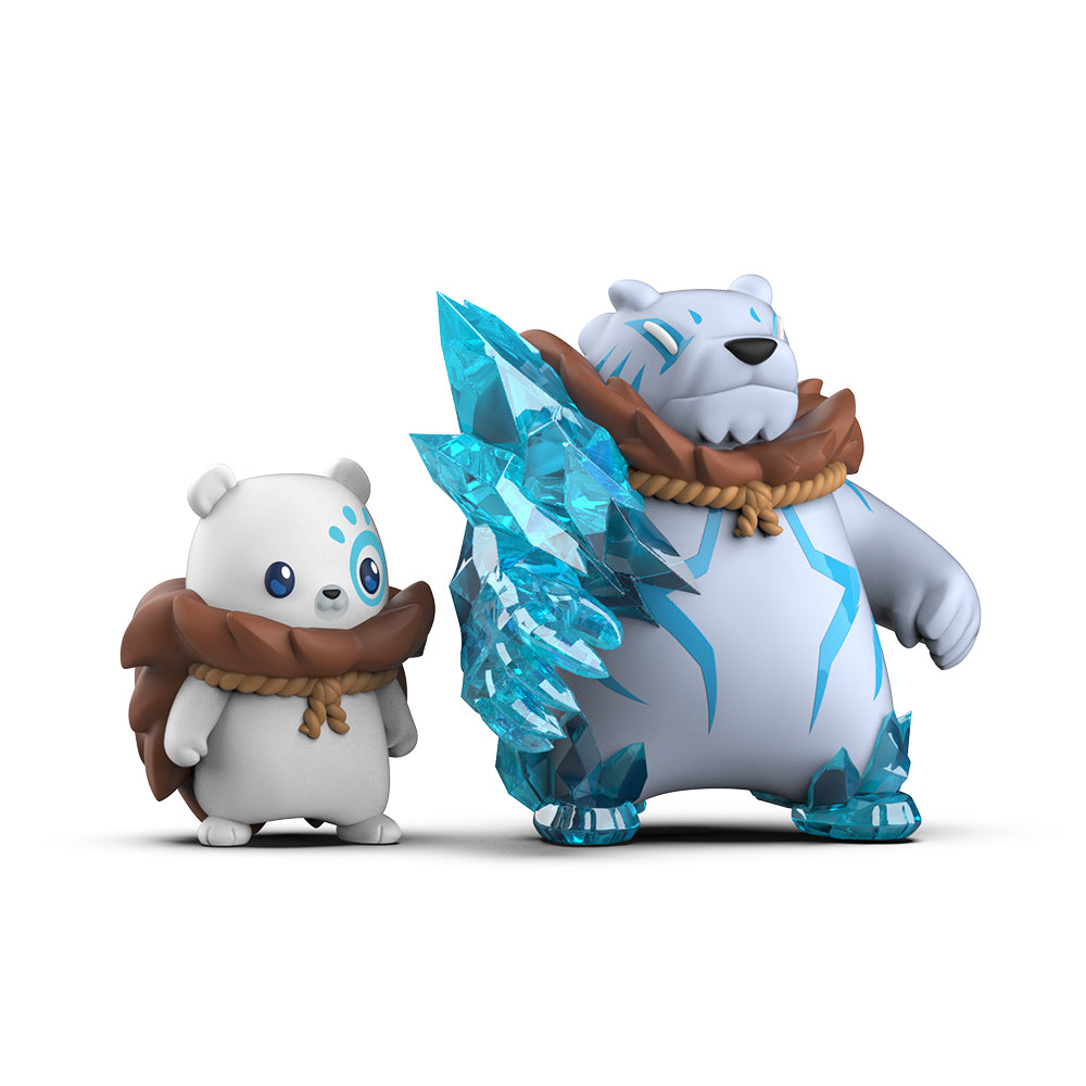 Two Casting Shadows: Frost Polarpaw & Frost the Merciless vinyl figures with crystal elements, the smaller one appears timid while the larger one looks protective, both wearing brown scarves. Made by Unstable Games.