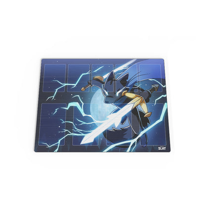 A Here to Slay: Warriors & Druids play mat featuring a design of a black and yellow robot superhero in action, surrounded by blue and white electrical effects on a grid background, from Unstable Games.