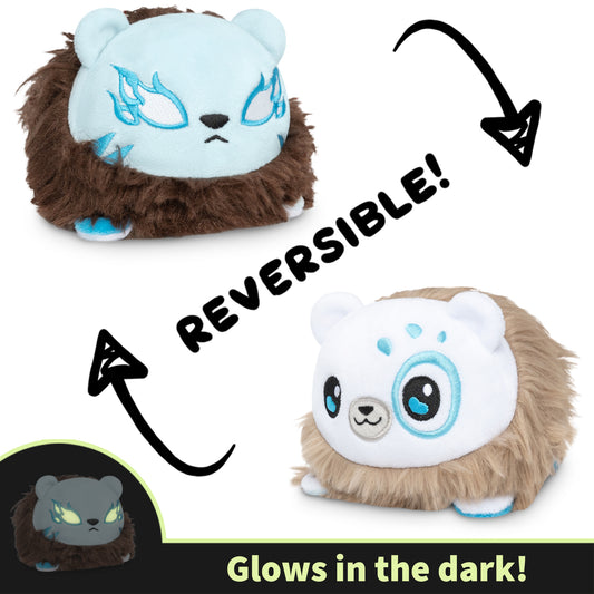 Casting Shadows: Frost Polarpaw & Frost the Merciless Reversible Plushie by Unstable Games that flips between a sad blue face and a happy white face, with 