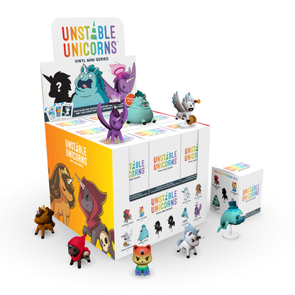A display of Unstable Games' "Unstable Unicorns: Vinyl Mini Series" collectible figures and toy packaging with various colorful unicorn characters.