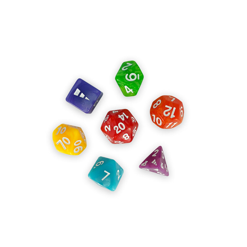 A collection of colorful Unstable Games Dice from the Unstable Games game, with various numbers visible, scattered on a white background.