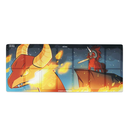 Illustrated Unstable Unicorns: Dragon Slayer Expansion play mat featuring a fantasy scene with two animated unicorn characters, one red and one yellow, amidst a fiery and dramatic sky by Unstable Games.