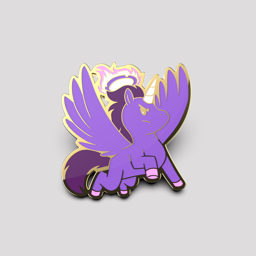 A Dark Angel Unicorn pin of a cartoon-style, winged angel unicorn with a golden halo and accents, showcased on a light gray background by Unstable Games.