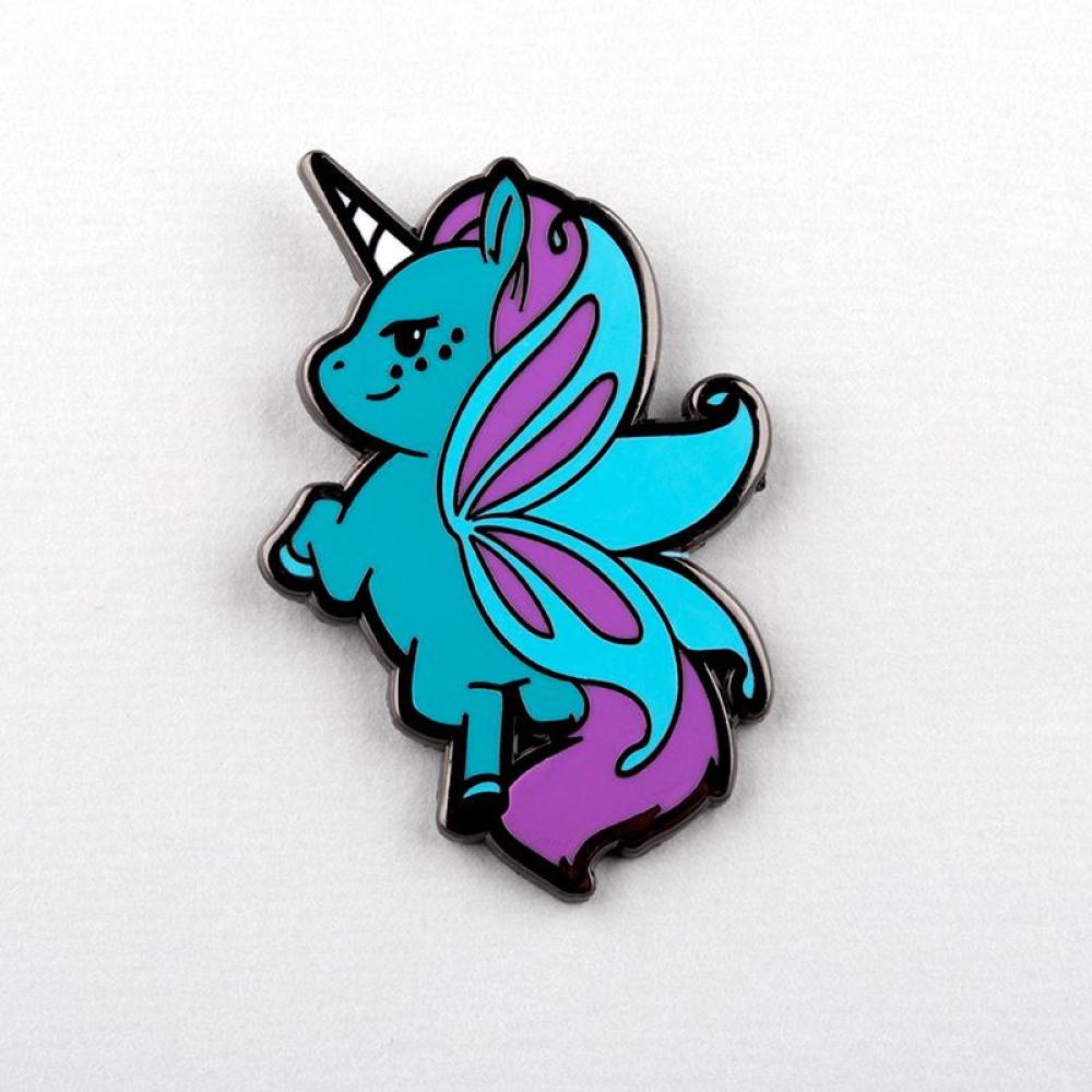A vibrant enamel pin featuring a Magic Flying Unicorn Pin with a pink and purple mane and tail, and a silver-toned outline, displayed on a plain white background by Unstable Games.