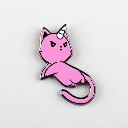 A pink metal enamel pin depicting The Magical Kittencorn Pin by Unstable Games, set against a plain gray background.